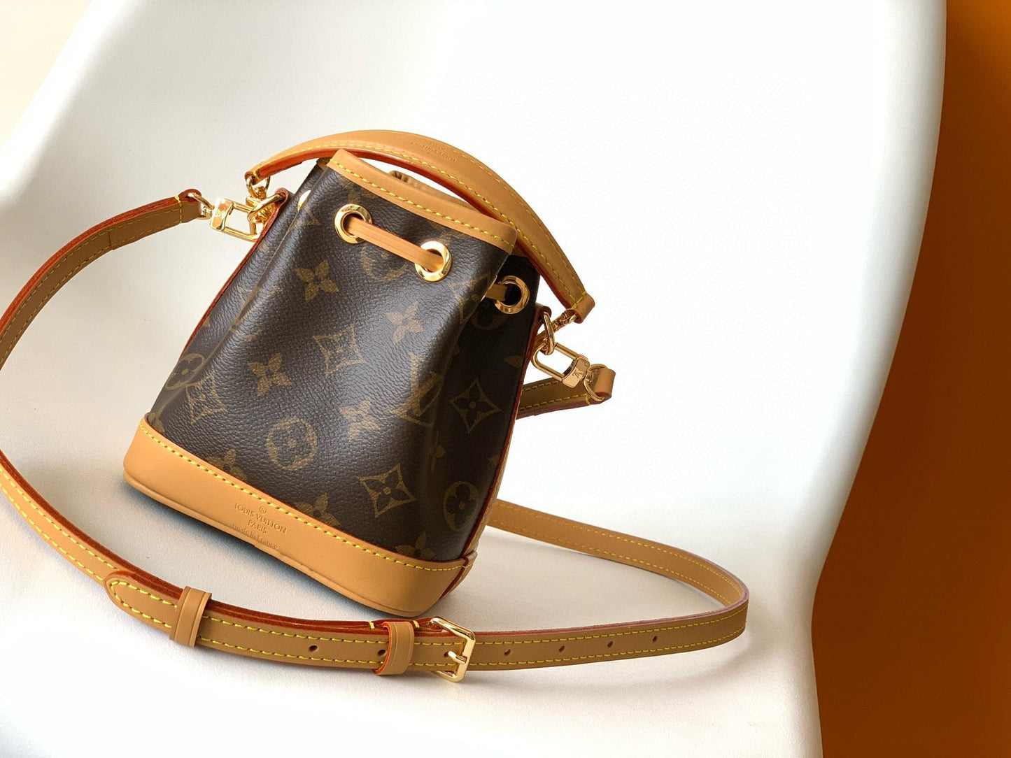 NANO NOÉ 16 IN BROWN MONOGRAM CALFSKIN