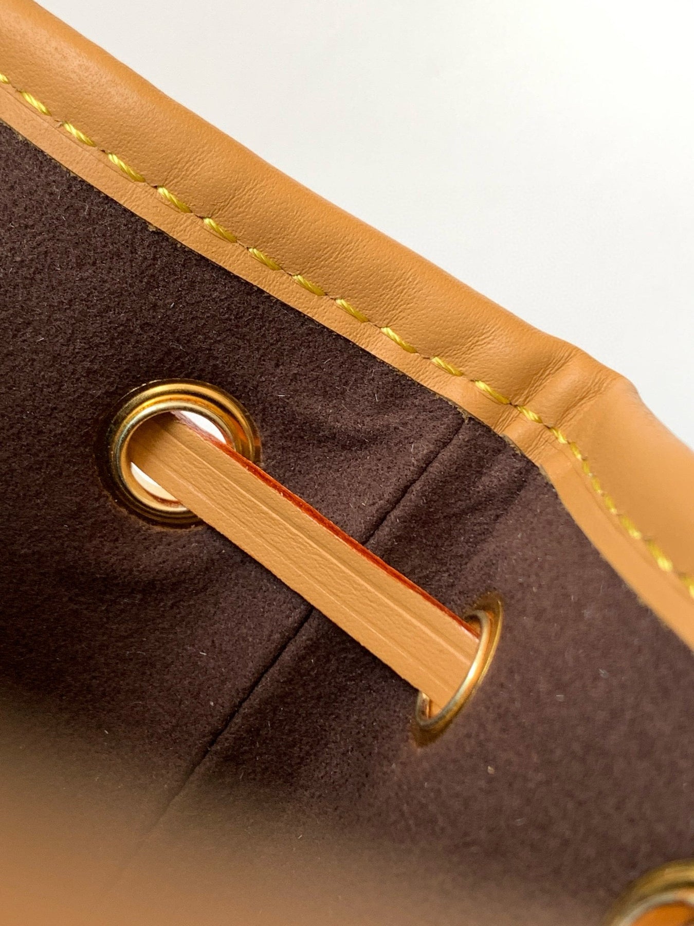 NANO NOÉ 16 IN BROWN MONOGRAM CALFSKIN