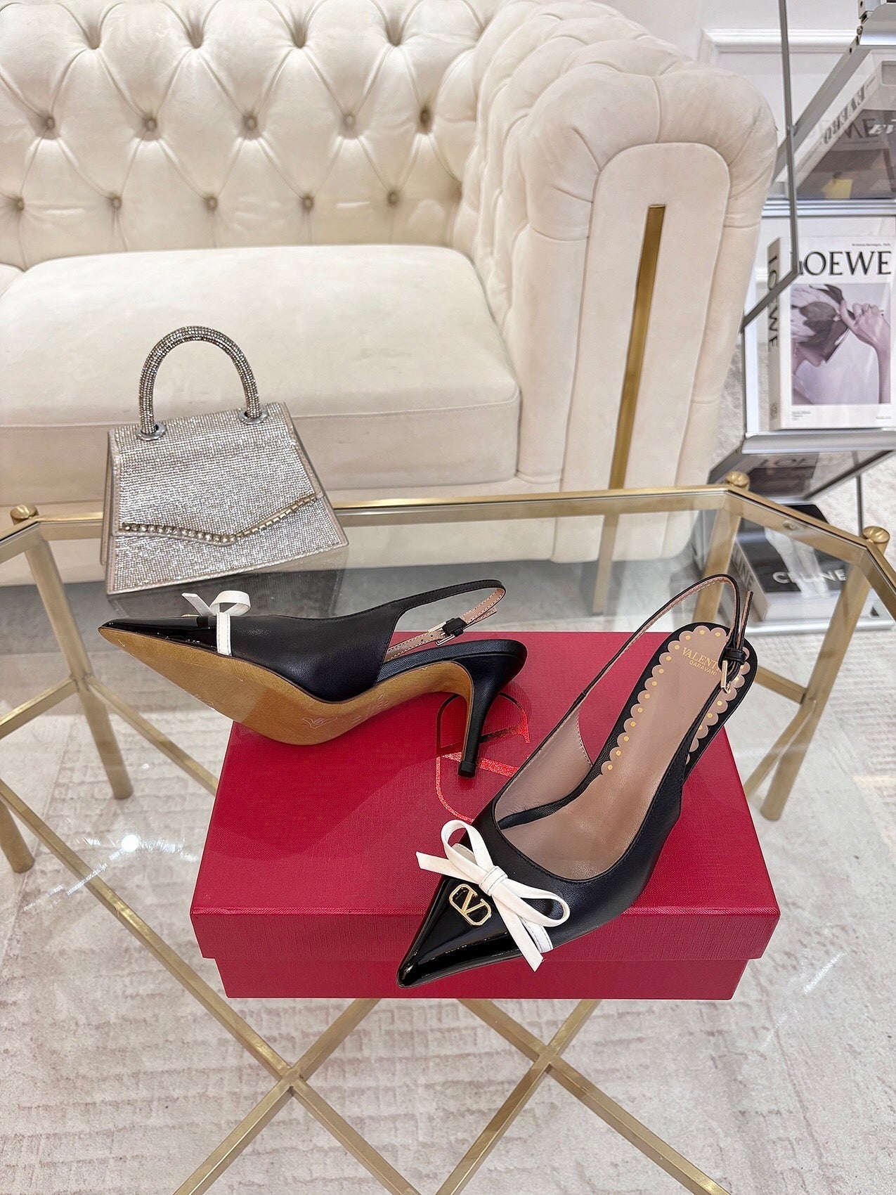 GARAVANI POINTED SLINGBACK PUMPS IN BLACK CALFSKIN