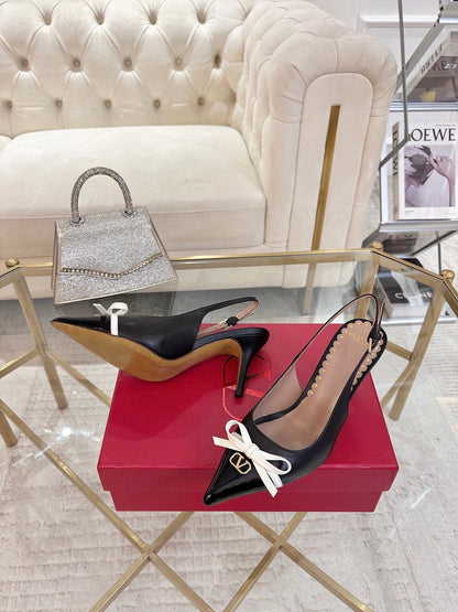 GARAVANI POINTED SLINGBACK PUMPS IN BLACK CALFSKIN