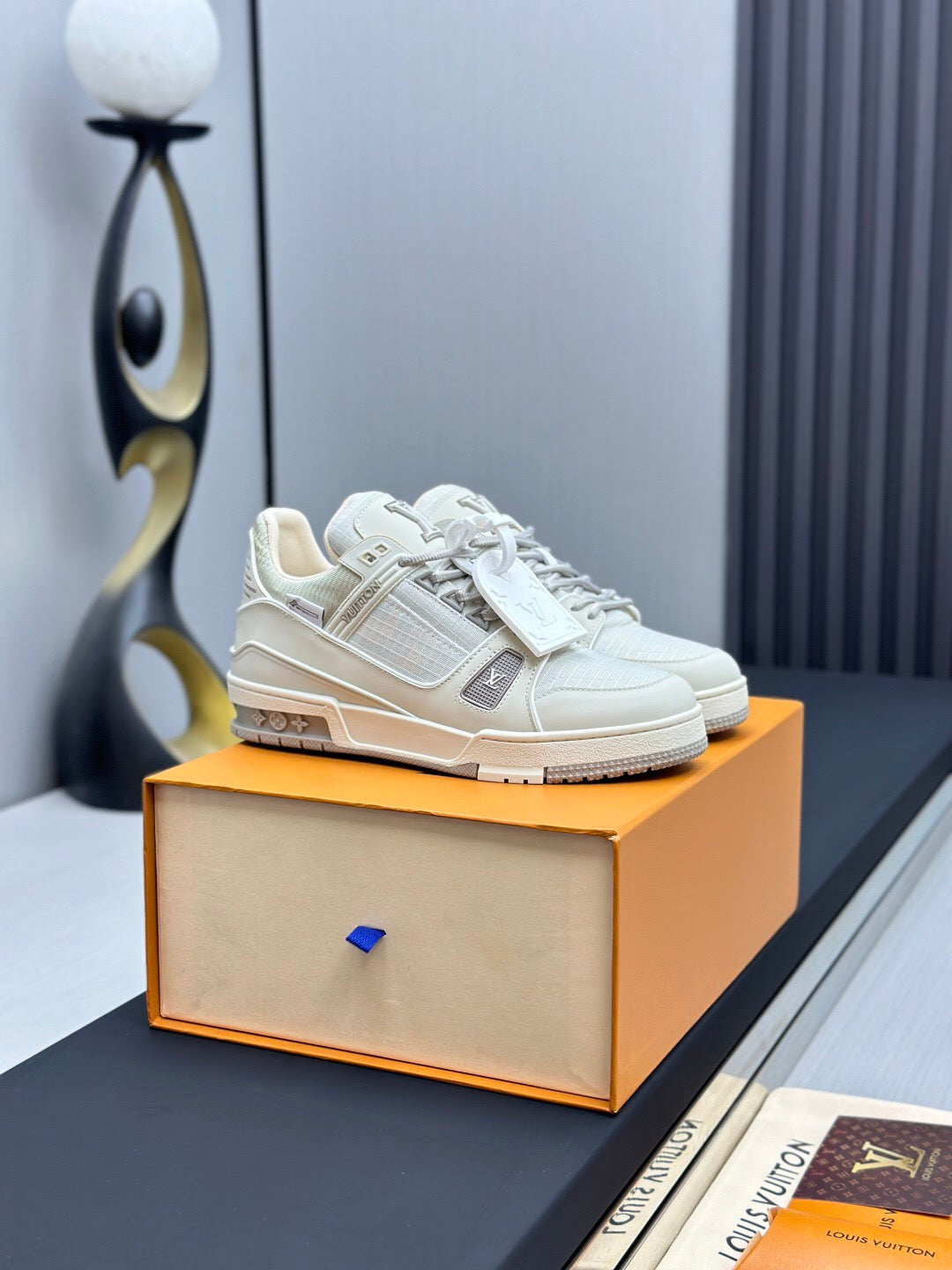 LV TRAINER SNEAKER IN GREY CALFSKIN