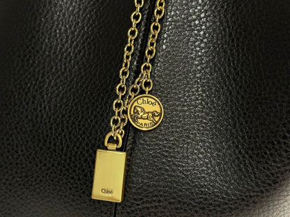 Chlo Spin tote bag in black grained leather