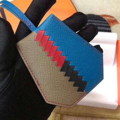 HERM Clochette Cles Grand Tressage Charm In Taupe/Blue