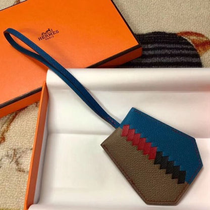 HERM Clochette Cles Grand Tressage Charm In Taupe/Blue