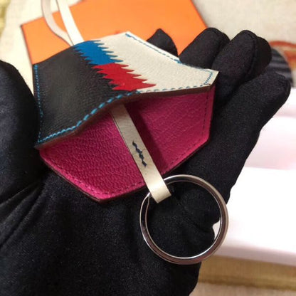 HERM Clochette Cles Grand Tressage Charm In White/Black