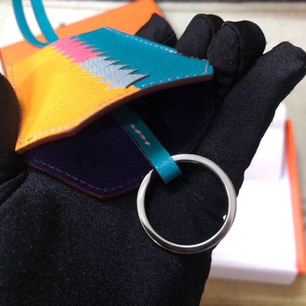 HERM Clochette Cles Grand Tressage Charm In Yellow/Turquoise