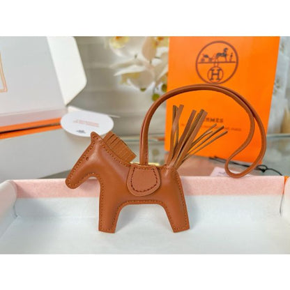 HERM Rodeo PM Bag Charm in Gold Lambskin