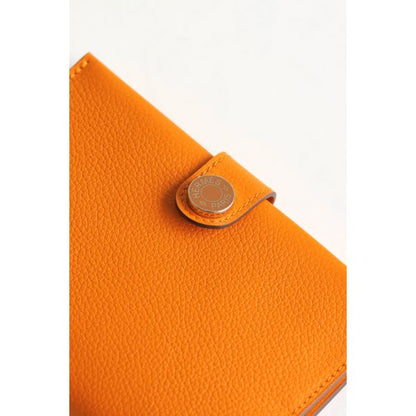 HERM R.M.S Passport Holder in Apricot Evercolor Calfskin