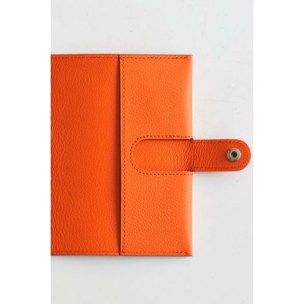 HERM R.M.S Passport Holder in Orange Evercolor Calfskin
