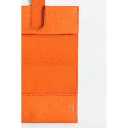 HERM R.M.S Passport Holder in Orange Evercolor Calfskin