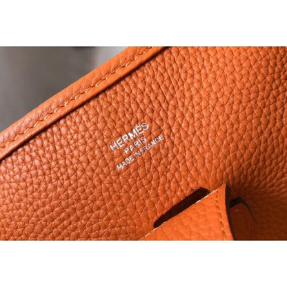 HERM Evelyne III 29 PM Bag In Orange Clemence Leather