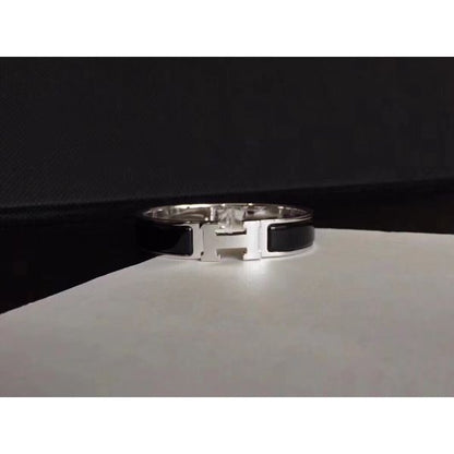 HERM Black Enamel Clic H PM Bracelet