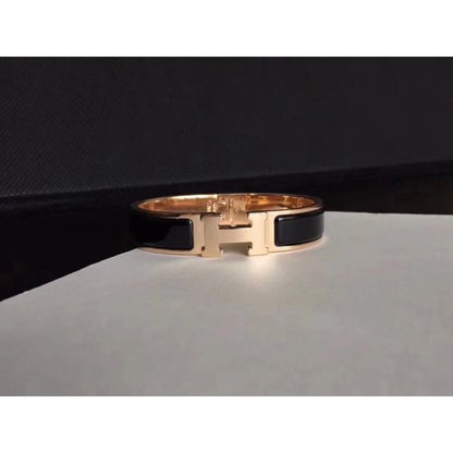 HERM Black Enamel Clic H PM Bracelet