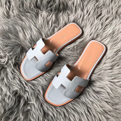 HERM Oran Slide Sandals In Blue Lin Clemence Leather