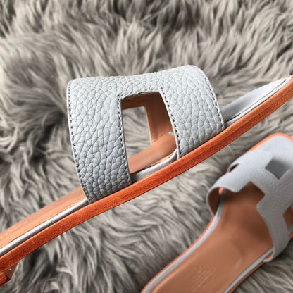 HERM Oran Slide Sandals In Blue Lin Clemence Leather