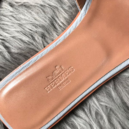 HERM Oran Slide Sandals In Blue Lin Clemence Leather