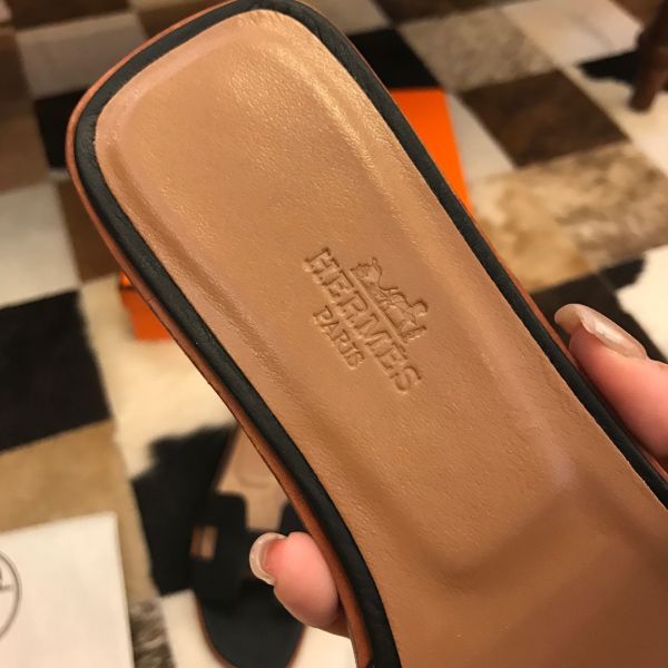 HERM Oran Slide Sandals In Black Clemence Leather