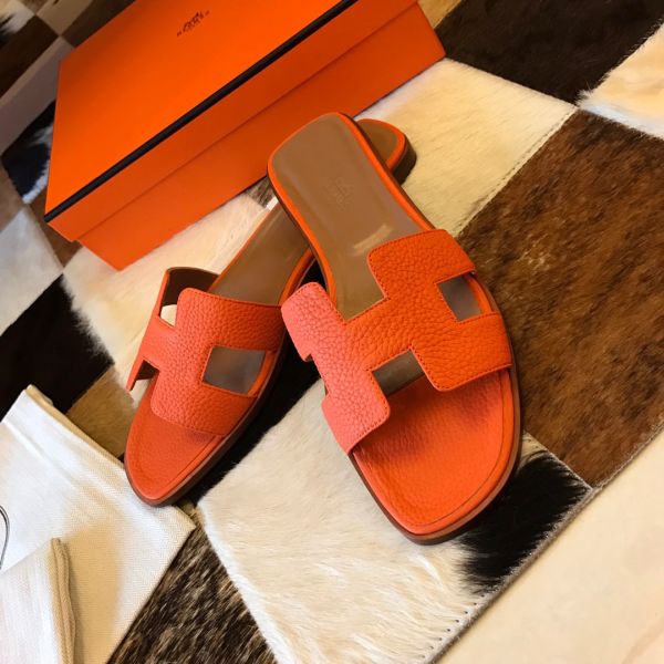HERM Oran Slide Sandals In Orange Clemence Leather