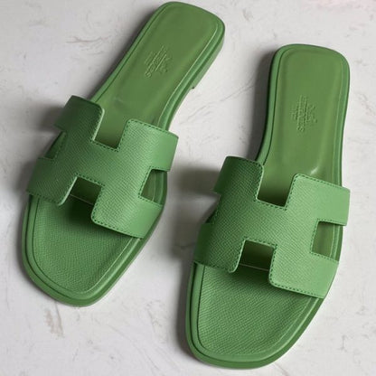 HERM Oran Slide Sandals In Vert Criquet Epsom Calfskin
