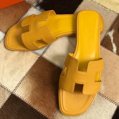 HERM Oran Slide Sandals In Yellow Epsom Calfskin
