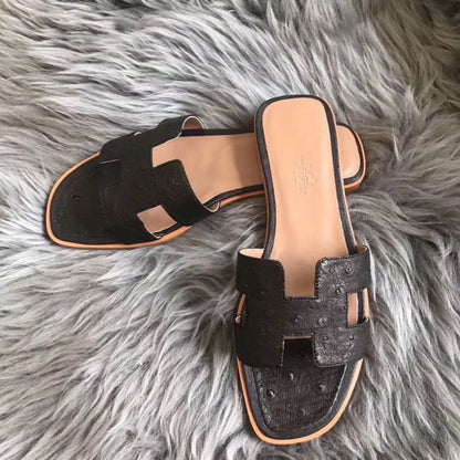 HERM Oran Sandals In Black Ostrich Leather
