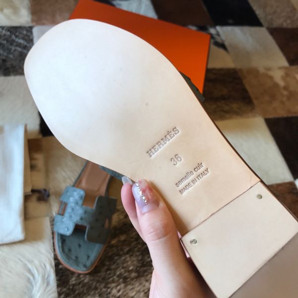 HERM Oran Slide Sandals In Vert Amande Ostrich Leather