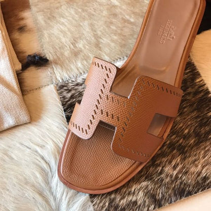 HERM Oran Slide Sandals In Gold Epsom Perforated Calfskin