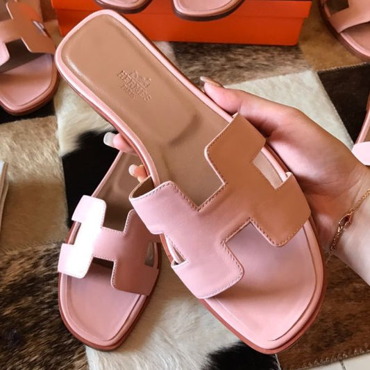 HERM Oran Slide Sandals In Pink Swift Calfskin