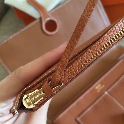 HERM Dogon Duo Wallet In Gold Clemence Leather