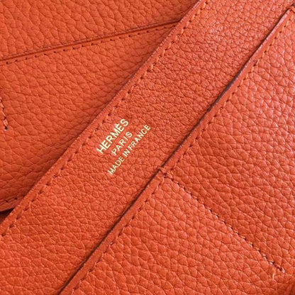 HERM Dogon Duo Wallet In Orange Clemence Leather
