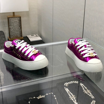 CASUAL SNEAKER IN MAGENTA PURPLE METALLIC LAMBSKIN WITH GOLD LOGO
