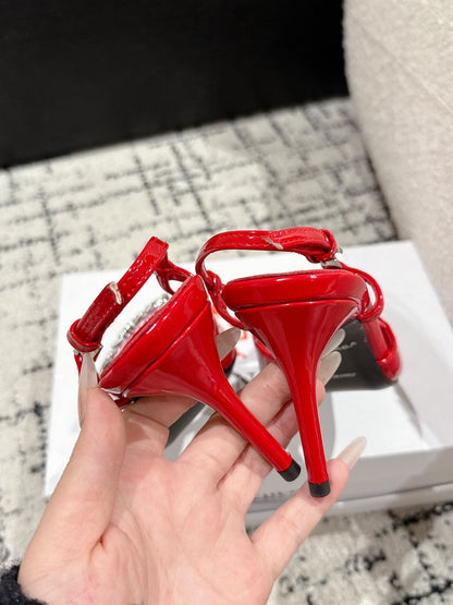 POINTED HIGH SLINGBACK IN RED PATENT CALFSKIN WITH CRYSTAL BUCKLE