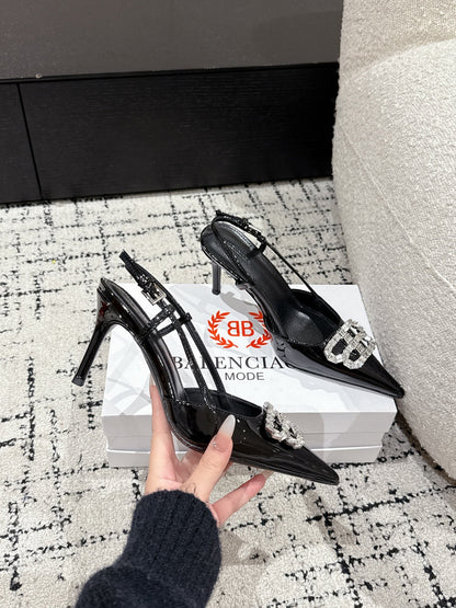 POINTED HIGH SLINGBACK IN BLACK PATENT CALFSKIN WITH CRYSTAL BUCKLE