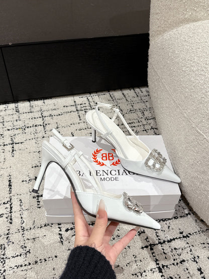 POINTED HIGH SLINGBACK IN WHITE PATENT CALFSKIN WITH CRYSTAL BUCKLE