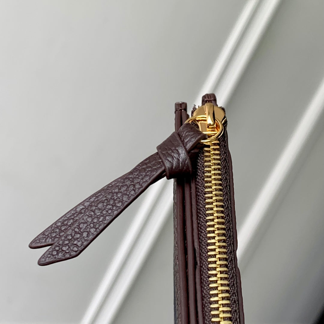 FÉLICIE POCHETTE 21 IN DARK BROWN MONOGRAM EMBOSSED LOGO CALFSKIN