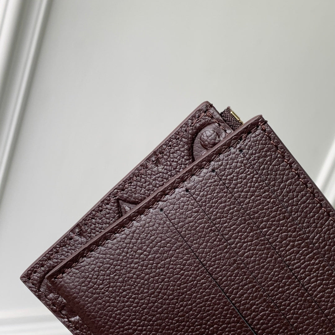 FÉLICIE POCHETTE 21 IN DARK BROWN MONOGRAM EMBOSSED LOGO CALFSKIN