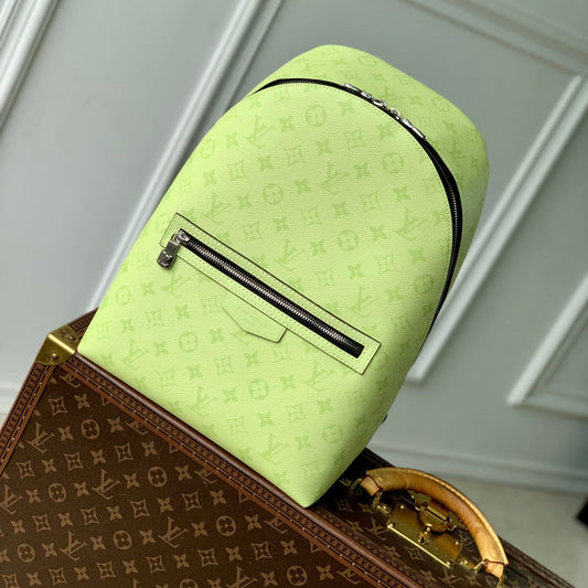 DISCOVERY SLIM BACKPACK 38 IN LEMON YELLOW MONOGRAM ECLIPSE REVERSE CALFSKIN