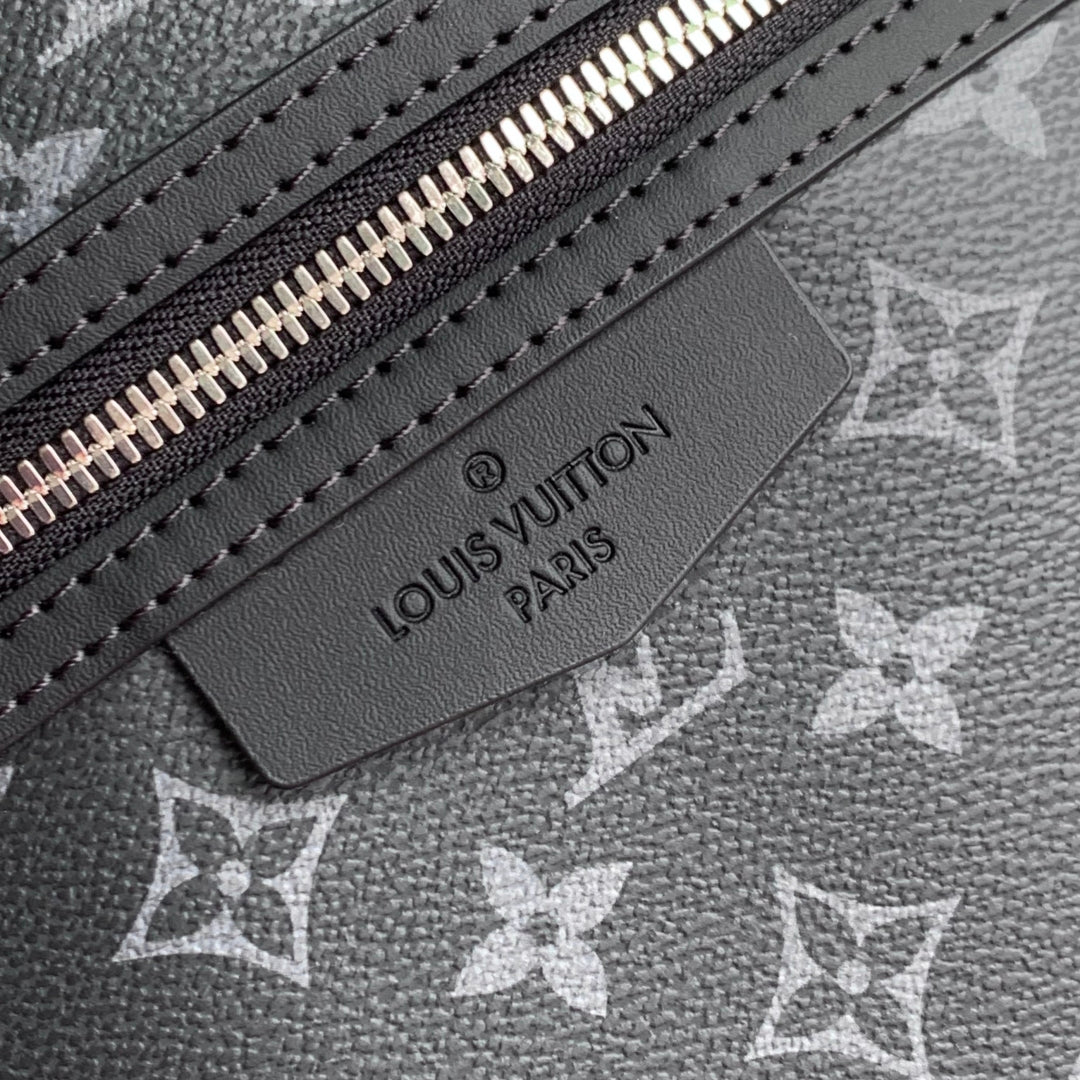 DISCOVERY SLIM BACKPACK 38 IN BLACK MONOGRAM ECLIPSE COATED CALFSKIN