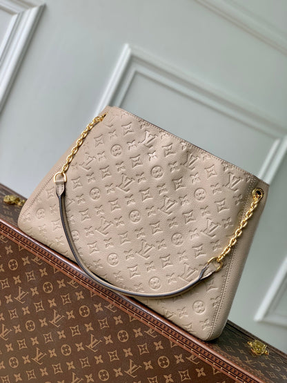 ANYTIME MM 42 IN TOURTERELLE GRAY MONOGRAM EMPREINTE CALFSKIN GOLD HARDWARE