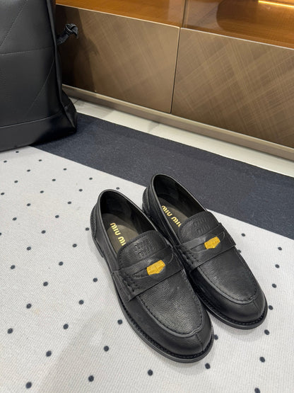 PENNY LOAFERS WITH GOLD COIN IN BLACK CALFSKIN
