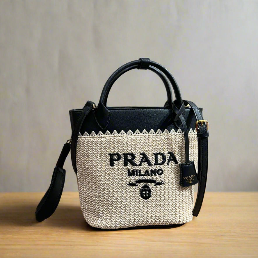 CROCHET TOTE BAG 23 IN BEIGE WOVEN RAFFIA WITH BLACK CALFSKIN STRAP