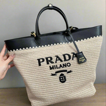 CROCHET TOTE BAG 32 IN BEIGE WOVEN RAFFIA WITH BLACK CALFSKIN STRAP