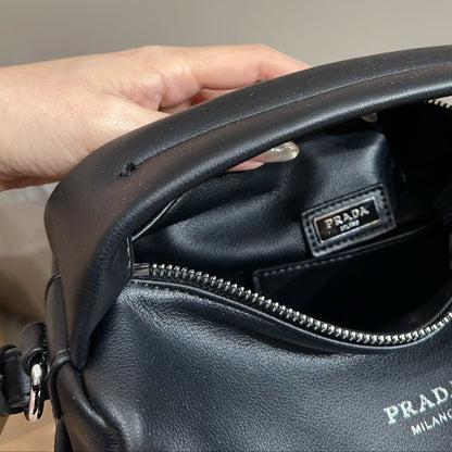 NOLITA CYLINDER BAG 22 IN BLACK SHINY LAMBSKIN