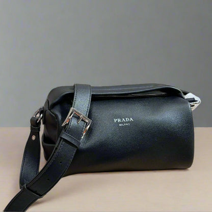 NOLITA CYLINDER BAG 22 IN BLACK SHINY LAMBSKIN