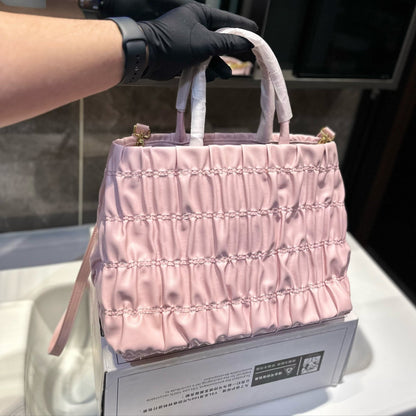 BOW DETAIL RUCHED TOP HANDLE BAG 29 IN LIGHT PINK SAFFIANO LEATHER