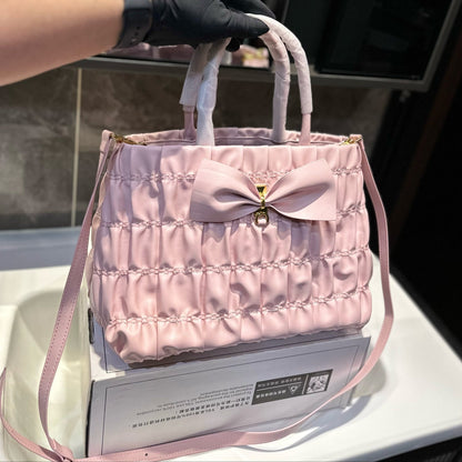 BOW DETAIL RUCHED TOP HANDLE BAG 29 IN LIGHT PINK SAFFIANO LEATHER