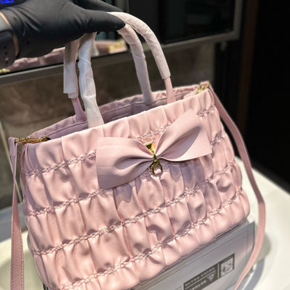 BOW DETAIL RUCHED TOP HANDLE BAG 29 IN LIGHT PINK SAFFIANO LEATHER