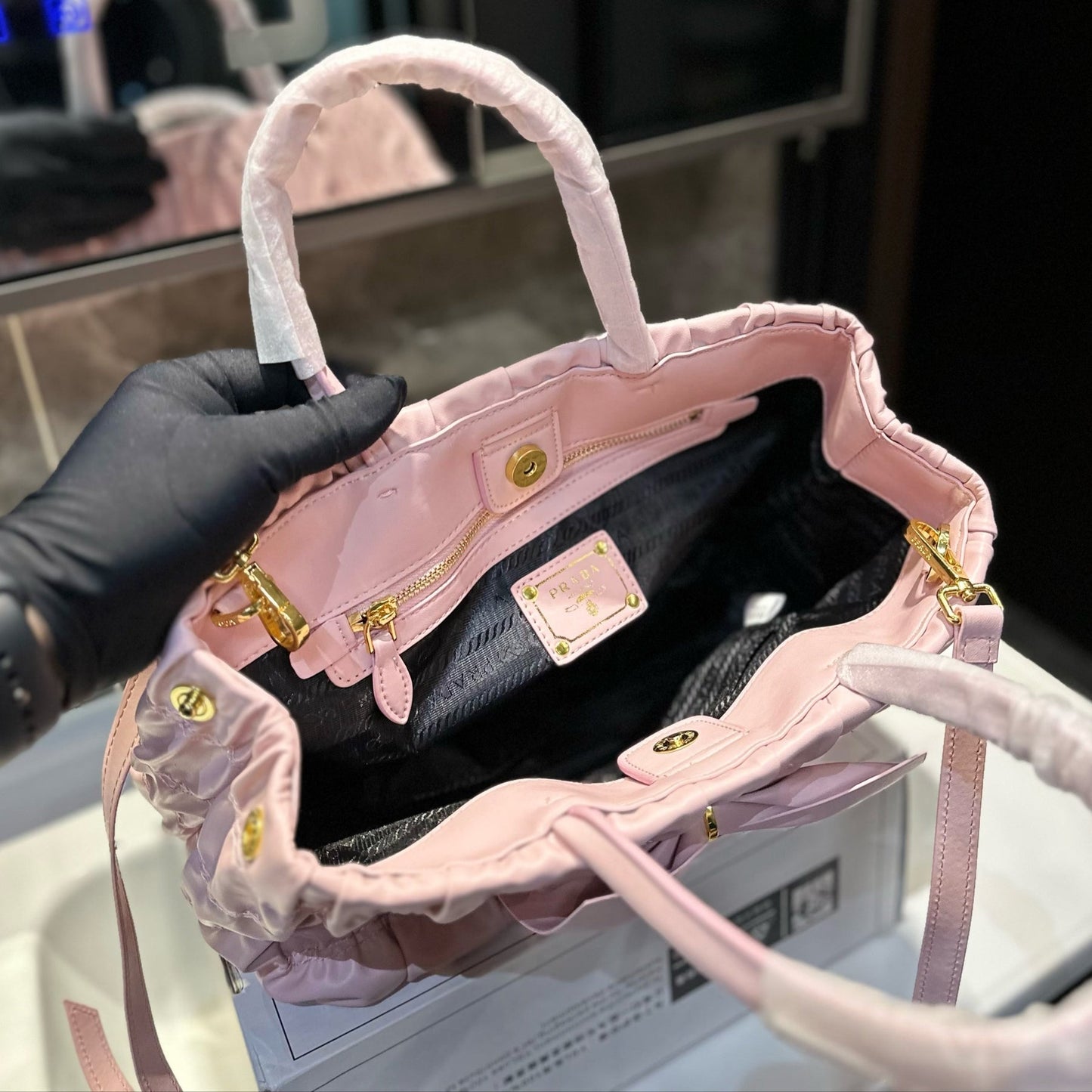 BOW DETAIL RUCHED TOP HANDLE BAG 29 IN LIGHT PINK SAFFIANO LEATHER