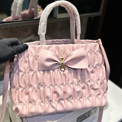 BOW DETAIL RUCHED TOP HANDLE BAG 29 IN LIGHT PINK SAFFIANO LEATHER