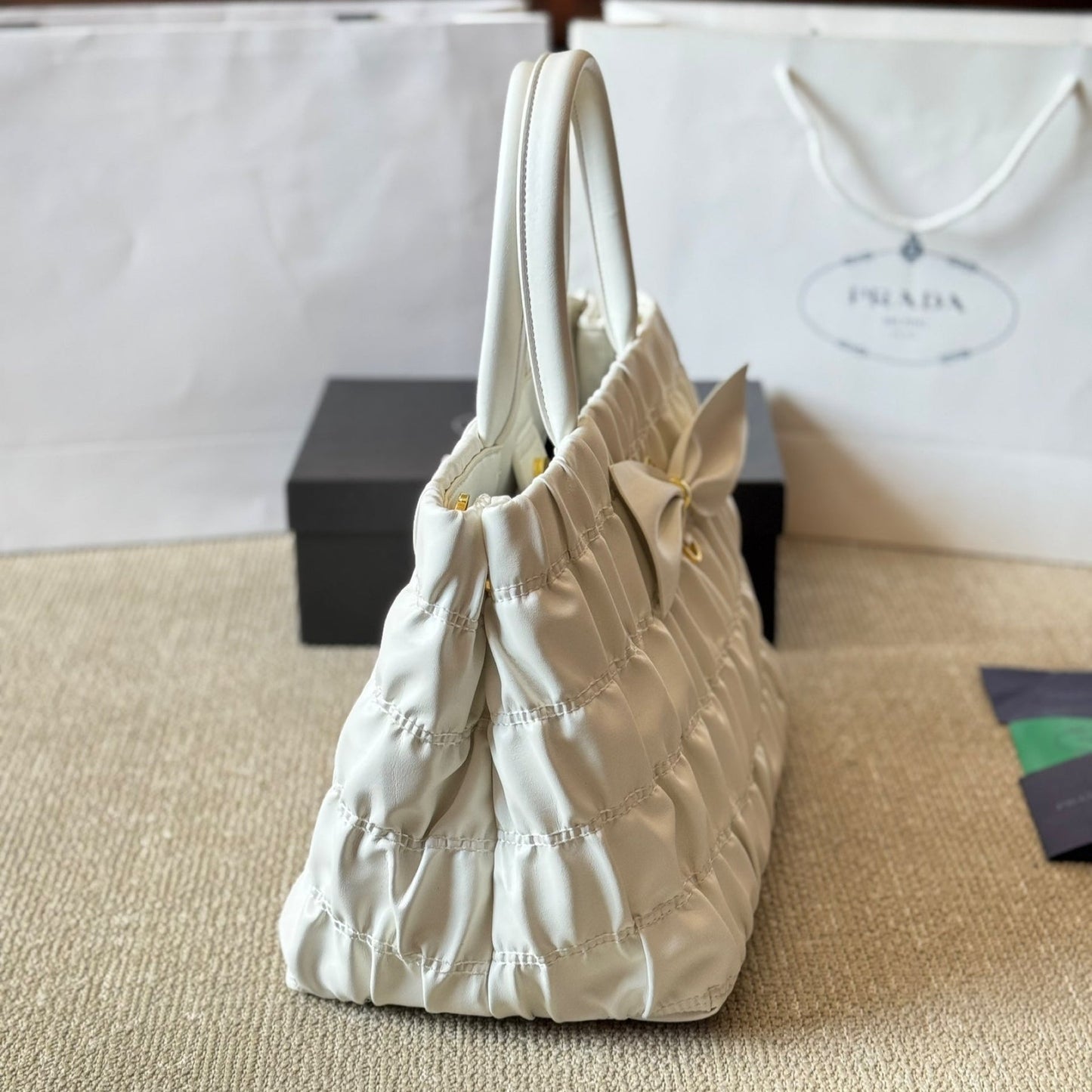 BOW DETAIL RUCHED TOP HANDLE BAG 28 IN WHITE SAFFIANO LEATHER